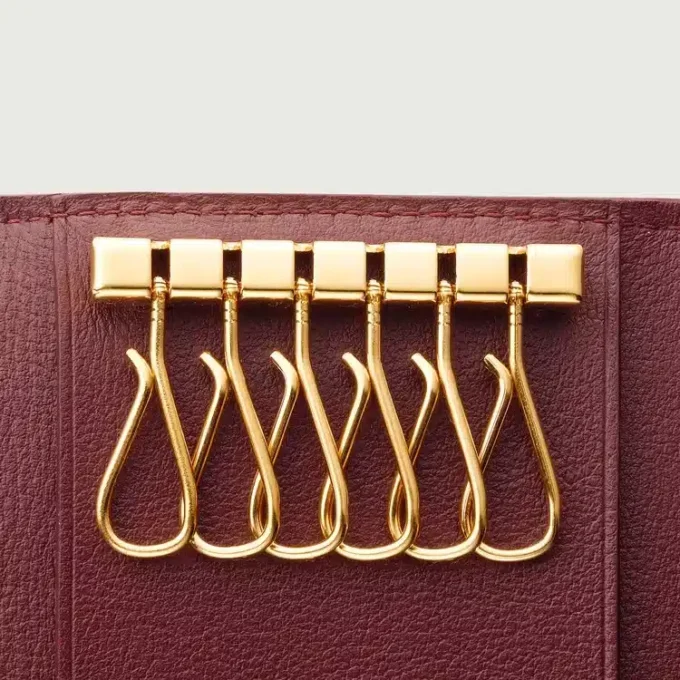 Porte-clés 6 clés, Must de Cartier – Cuir de veau bordeaux, finition dorée – Cartier
