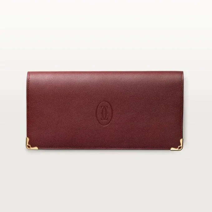 Portefeuille international à soufflets, Must de Cartier – Cuir de veau bordeaux, finition dorée – Cartier Portefeuille international à soufflets, Must de Cartier – Cuir de veau bordeaux, finition dorée – Cartier