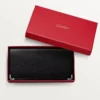 Portefeuille international à soufflets, Must de Cartier – Cuir de veau noir, finition en acier inoxydable – Cartier Portefeuille international à soufflets, Must de Cartier – Cuir de veau noir, finition en acier inoxydable – Cartier