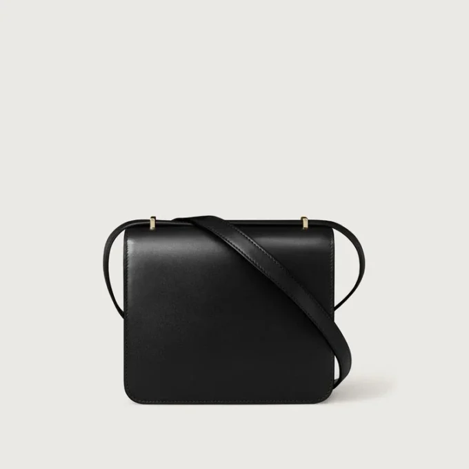 Sac à bandoulière, Mini, Double C de Cartier – Cuir de veau noir, finition en or et émail noir – Cartier Sac à bandoulière, Mini, Double C de Cartier – Cuir de veau noir, finition en or et émail noir – Cartier