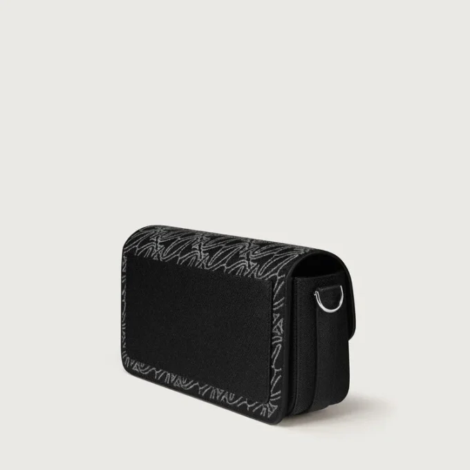 Sac East-West, C de Cartier